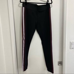 BCBGMaxAzria black w colorful side stripe leggings. Large